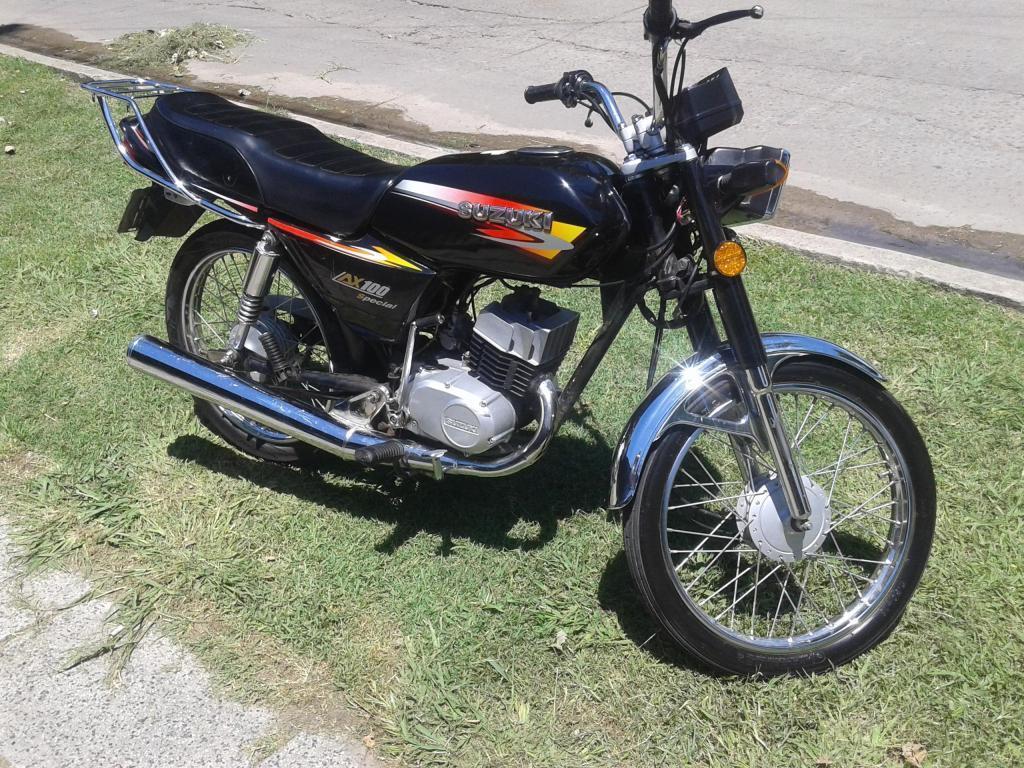 vendo permuto,suzuki ax 100 año 2014 impecable,titulo cedula y 08