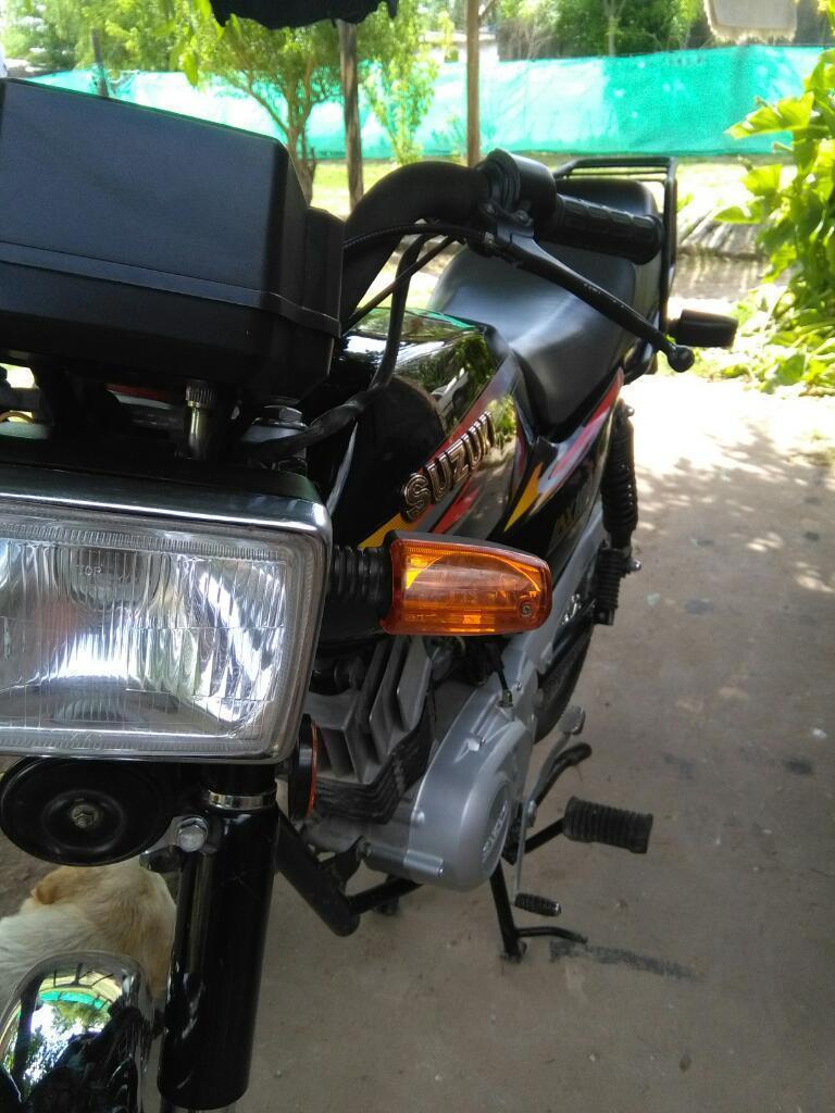 Suzuki Ax 100