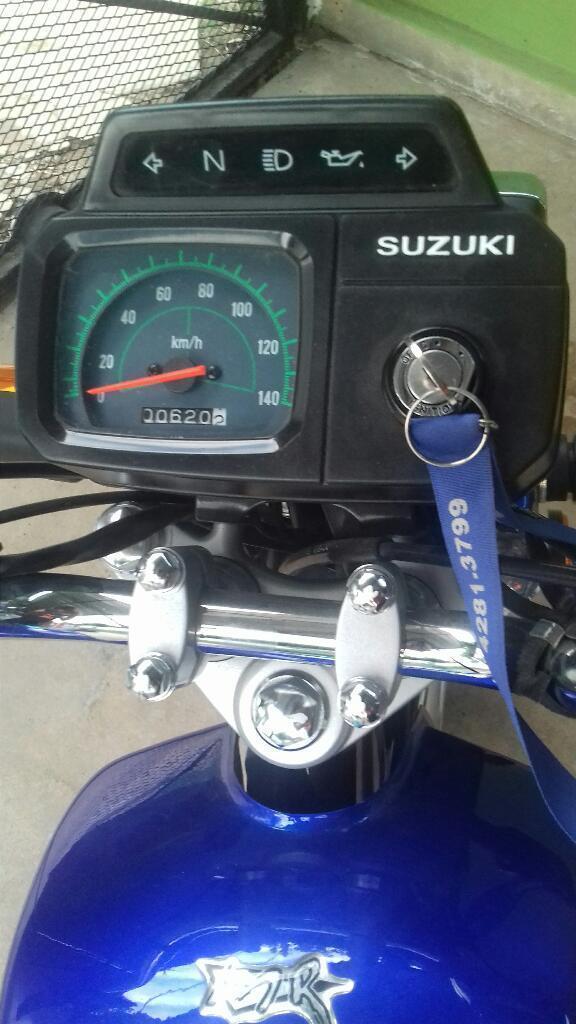 Vendo Moto Suzuki Ax100 con 600 Km.titul