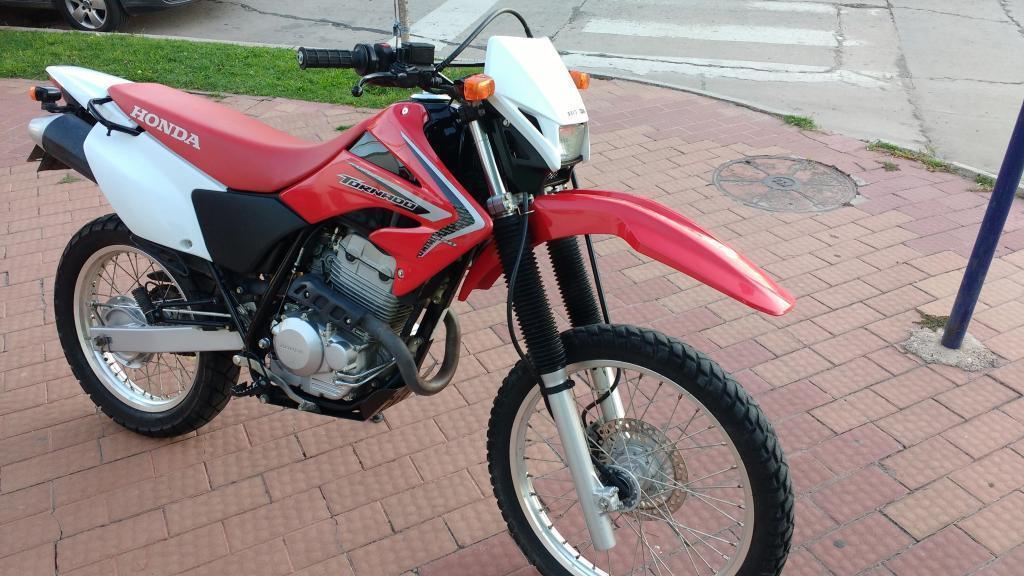 VENDO HONDA TORNADO MODELO 2014. EXCELENTE ESTADO