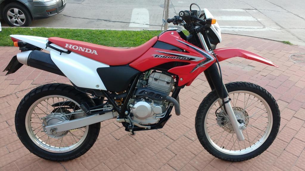 VENDO HONDA TORNADO MODELO 2014. EXCELENTE ESTADO