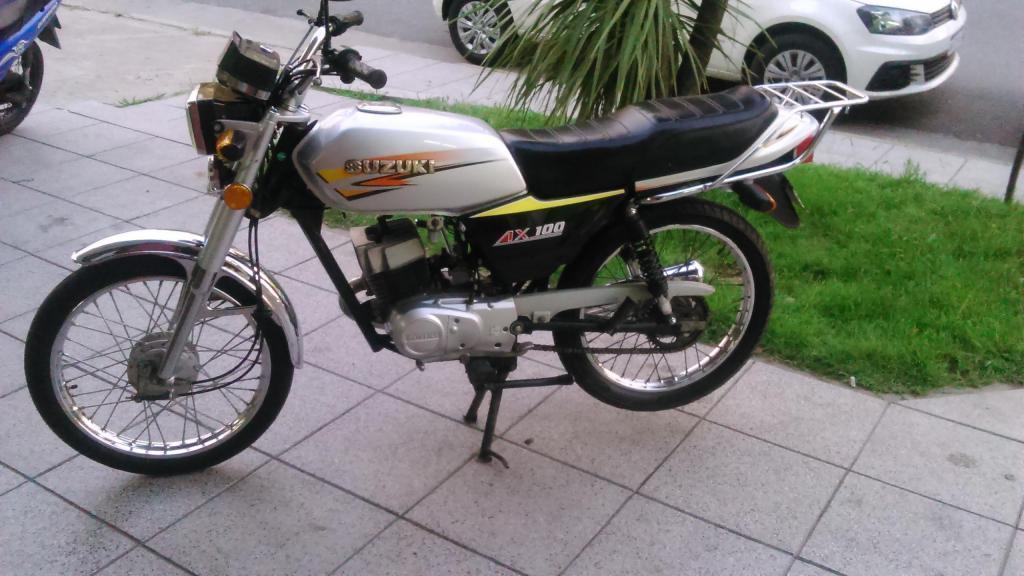 Suzuki Ax 100