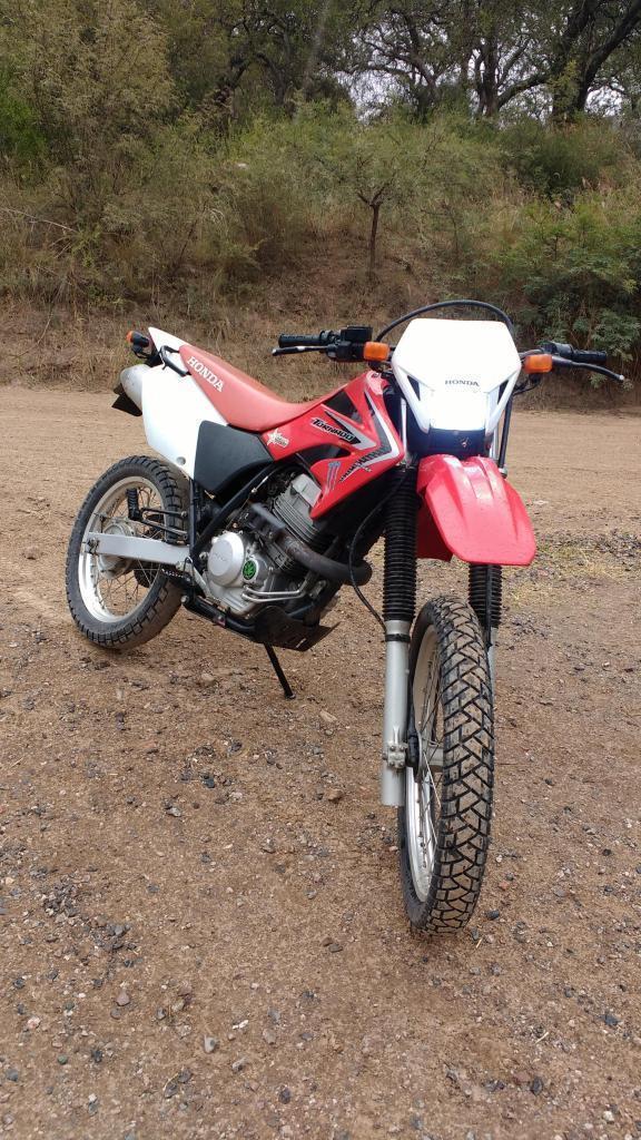 VENDO O PERMUTO HONDA TORNADO XR 293 cc