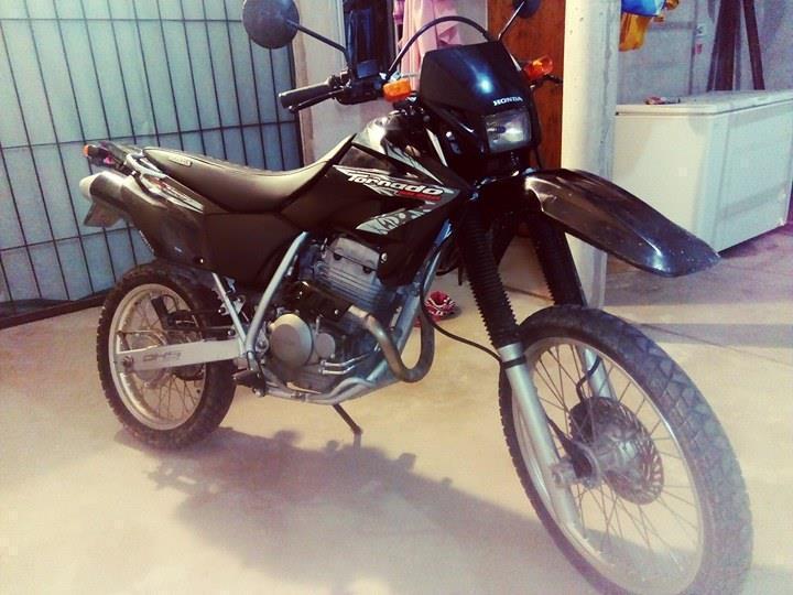 VENDO HONDA TORNADO MOD 2013 PERMUTO 65 contado