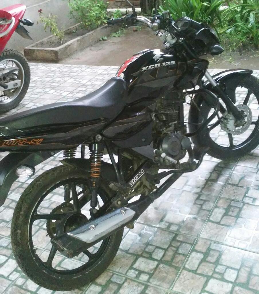 Liquido Rouser Bajaj 125. Modelo 2010