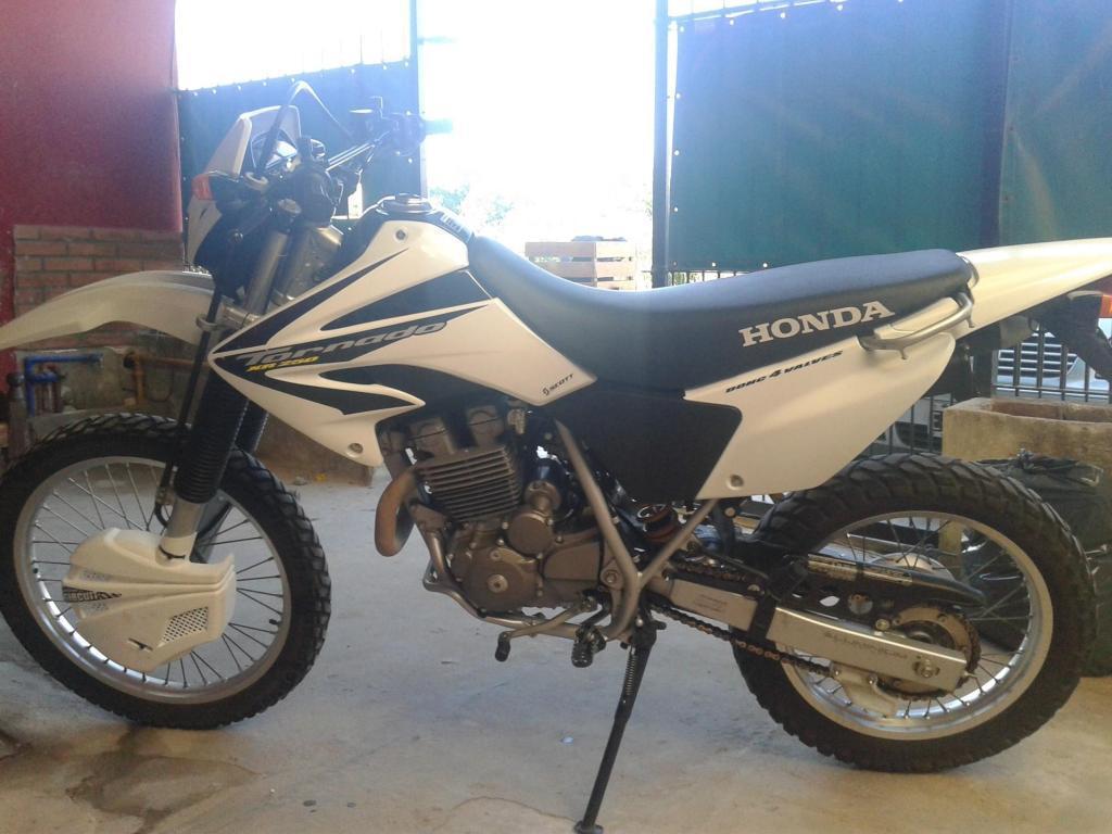 VENDO HONDA TORNADO ALARMA VTV TITULAR