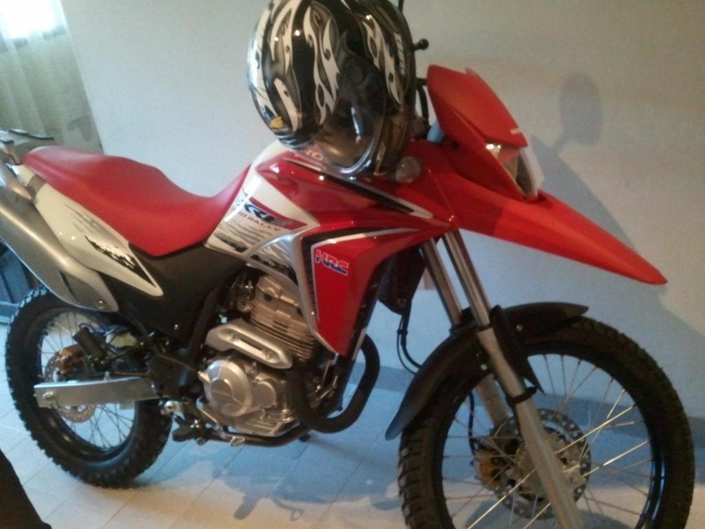 Vendo Honda XRE300 Rally modelo 2013 con solo 800 km