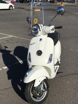 Vespa Lx 150 ie 2011 blanca Aut. CVT 4200 Km Alarma, Parabrisas