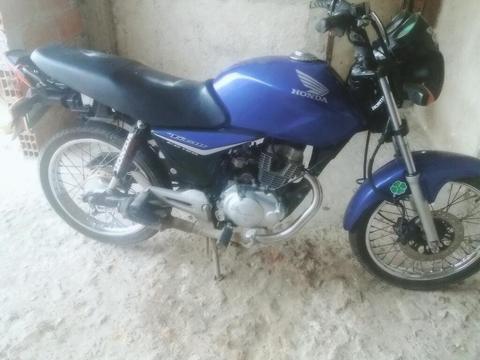 Vendo O Permuto Cg 2014 con Alarma